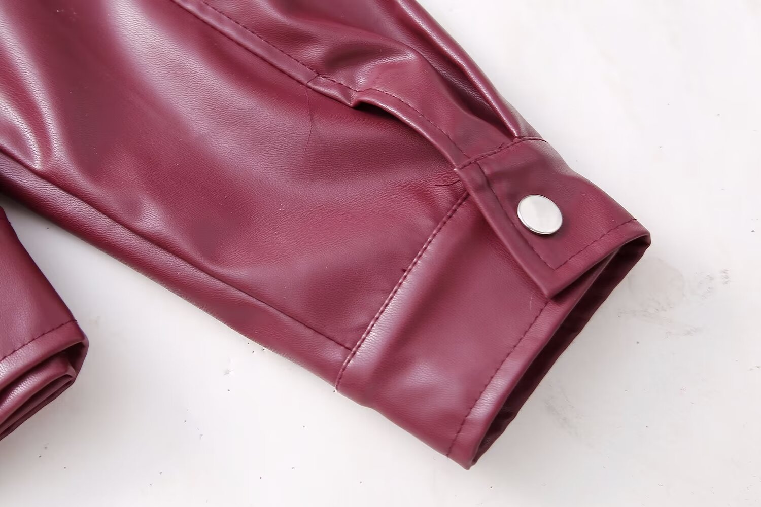 Veste Biker Similicuir Col Revers – Style Motarde Audacieux
